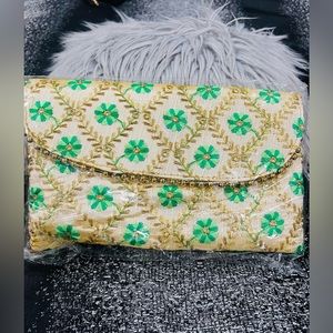 Clutch, gold and green flowers work. Light weight, NEW.